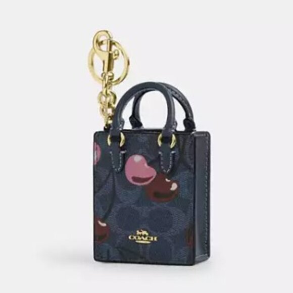 Coach North/South Mini Tote Bag Charm In Signature Canvas With Cherry Print - Picture 2 of 3